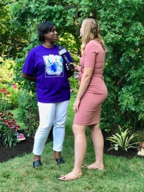 garden Walk Buffalo Chairperson Yolanda Fields interviewd by Spectrum News reporter Maura Christie.